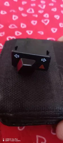 Botão de pisca com alerta.