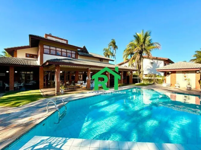Casa (sobrado) com 4 quartos, 2 suítes, 6 vagas e lazer à venda no Jardim Acapulco, Guaruj