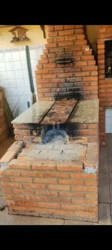 Reforma e concerto de churrasqueira e fogão de lenha