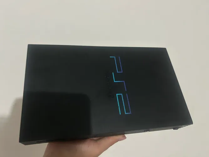 PS2 FAT COM DEFEITO/PARA PEÇAS OU REPARO( AVARIADO/NÃO LIGA)