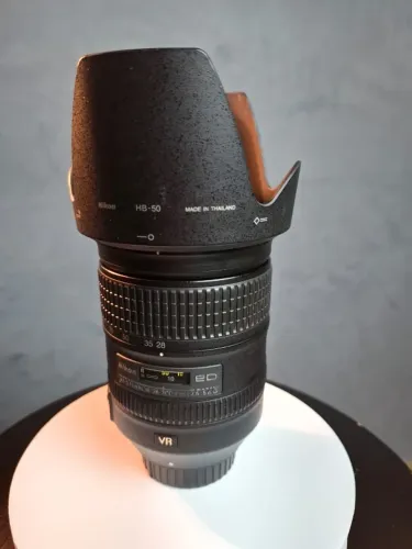 Lente Nikon 28 300mm com Parasol.