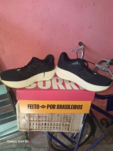 Tênis olimpkus corre