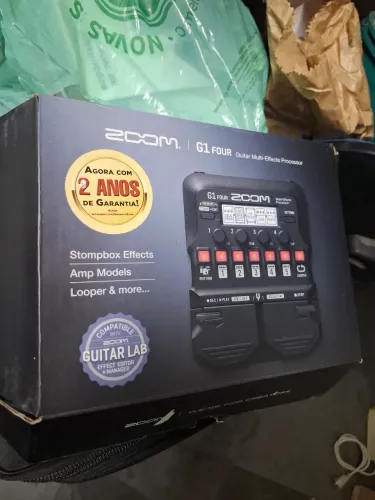 Pedal Zoom G1four manual fonte e caixa