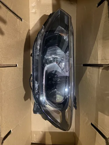 Farol tracker esquerdo 