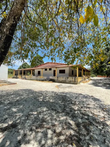 Terreno com casa grande