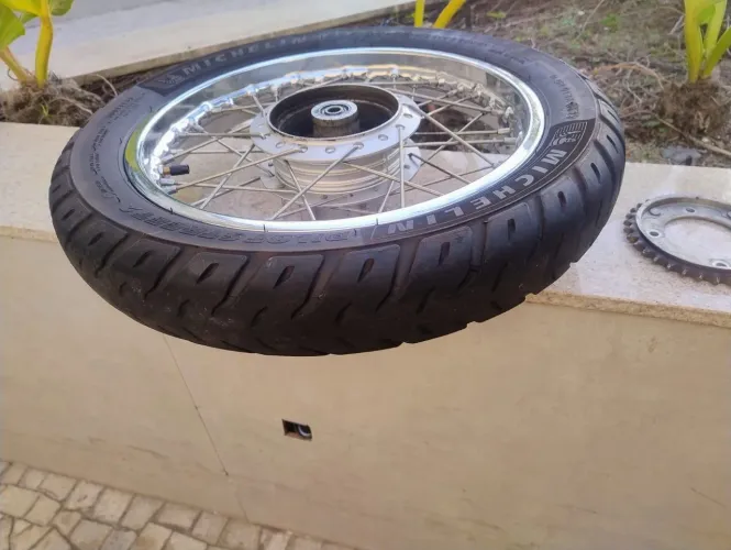 Vendo roda ? da pop 110, original.