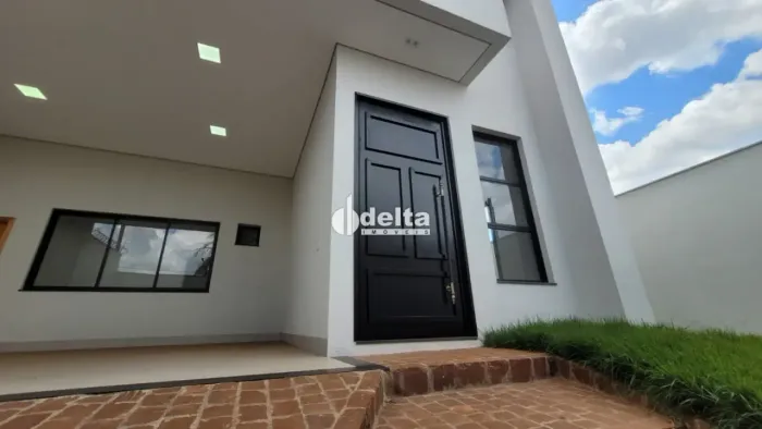 Casa residencial com 3 suítes disponível para venda no bairro Cidade Jardim em Uberlândia-
