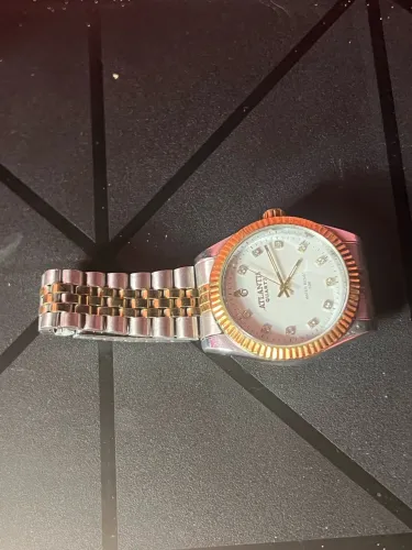 ? Relógio Atlantis Masculino Dourado e Prata