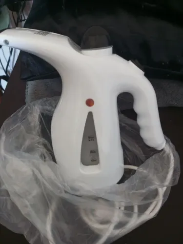 Passadeira de roupa a vapor