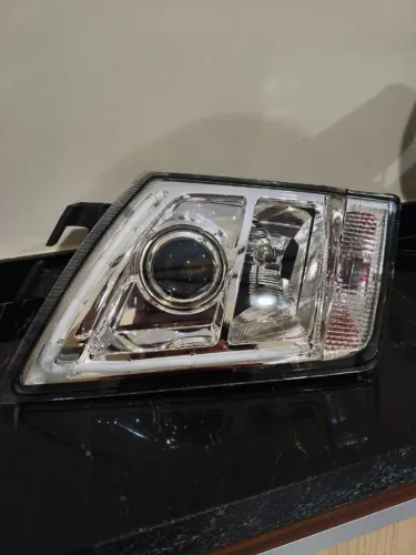 Farol caminhão volvo FH