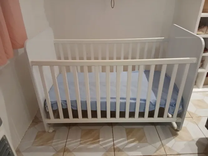 Berço com coxão.