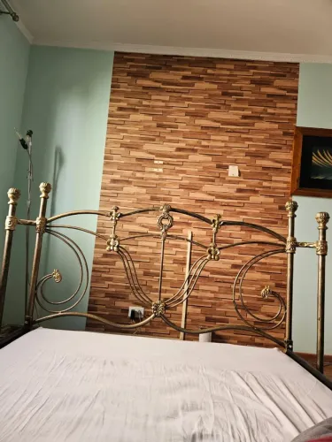 Cama de ferro ouro envelhecido