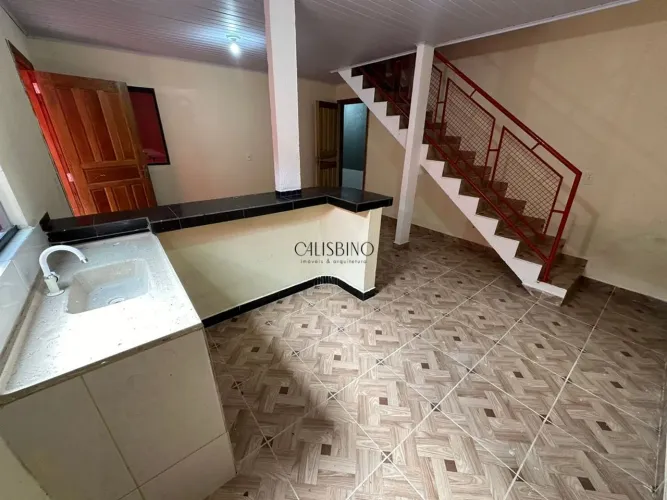 Casa Aconchegante de 2 Quartos com Ampla Garagem  Próximo ao Hospital do Amor
