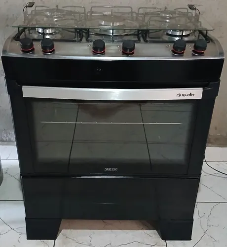 Vendo fogão 5 bocas Elétrico Conservado.