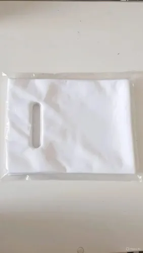 50 unidades sacolas plásticas - 20x15 boca de palhaço/ alça vazada