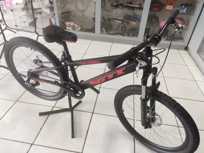 Bicicleta aro 24 MTB alumínio GTI modelo Nytro 7velocidades preto fosco/vermelho 7/12 anos
