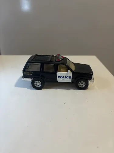 Carrinho Ford Explorer Police Dog Maisto Free Wheels