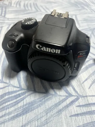 Canon T100