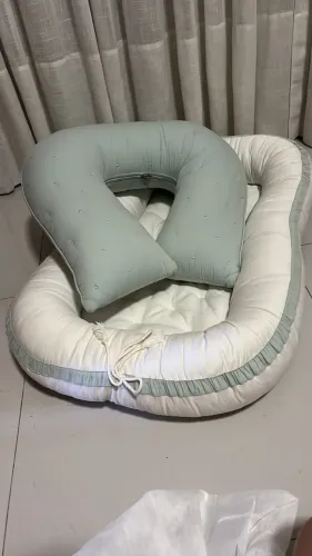 Almofada de amamentação e ninho