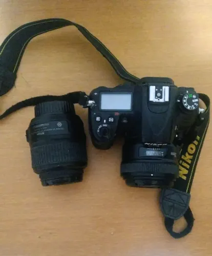 Nikon D7000 com lente 35mm e lente 18.55