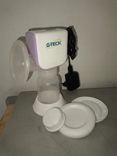 Bomba elétrica de tirar leite + alguns acessórios de brinde (ver descrição)
