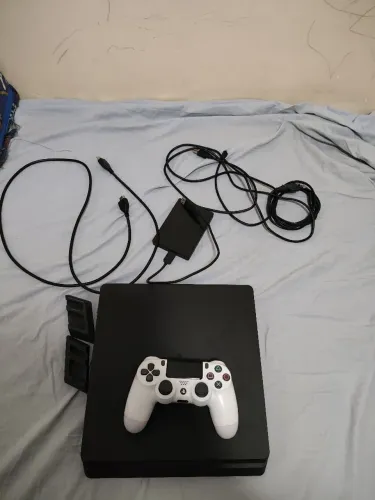 Ps4 slim + HD 2T e jogos