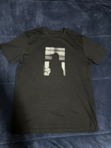 Camiseta Calvin Klein Jeans preta com estampa