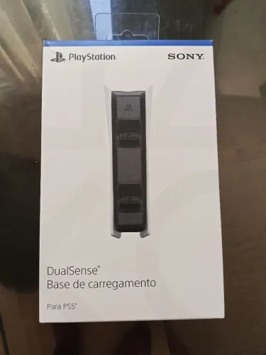 Vendo controle e base carregador ambos novos base aberta para teste