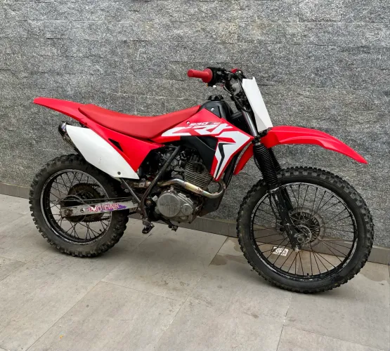 Moto trilha nx200 roupa crf preparada