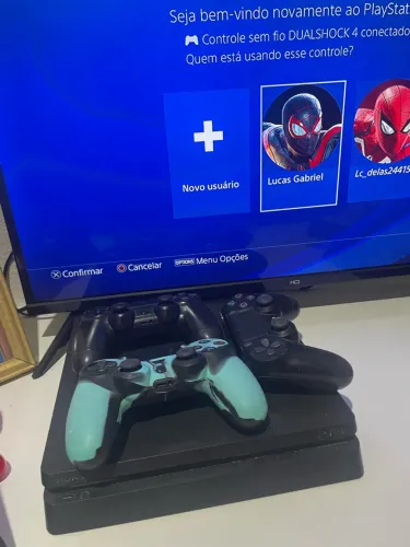 Ps4 com 3 controles 400gb em perfeito estado com 9 jogos incluso