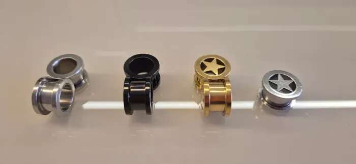 Alargadores de orelha 12mm aço.