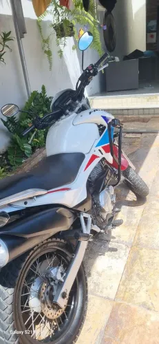 Vendo moto falcon tudo em dias ponto de transferi *-287