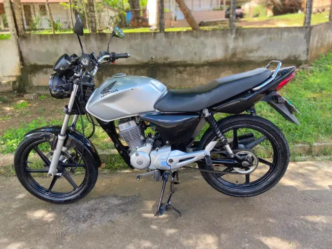 150 carburada esd moto de procedência " atrasada" .