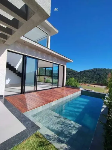 Casa com 3 suítes 270m² privativos em condomínio fechado para venda em Camboriú Santa Cata
