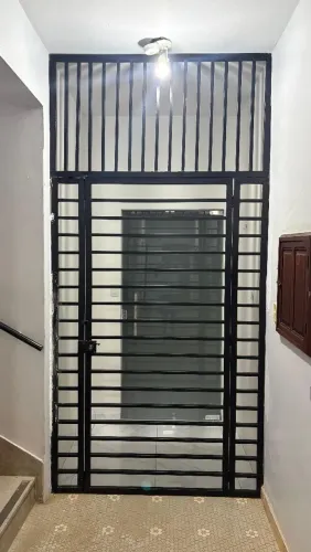 GRADE DE FERRO COM PORTA - SEGURANÇA REFORÇADA