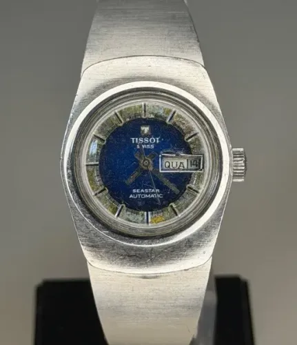 Relógio Tissot Seastar com caixa e pulseira em aço todo original movimento automático 25mm