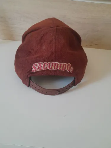 Boné sacudidos sitiantes e fazendeiros