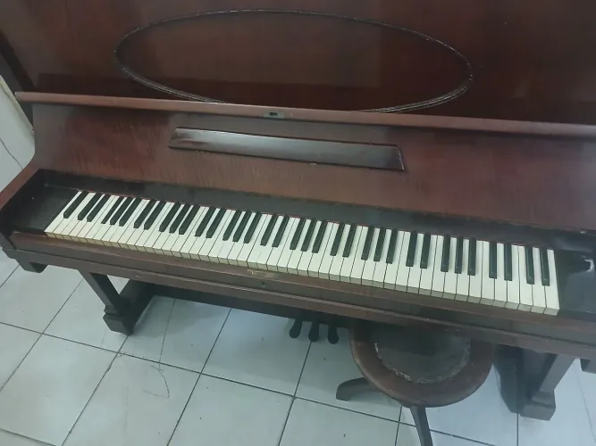 Vendo Piano marca Hreimler,usado em bom estado.