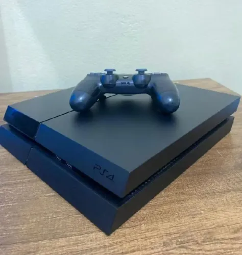 Vendo Ps4 FAT com jogos R$1200