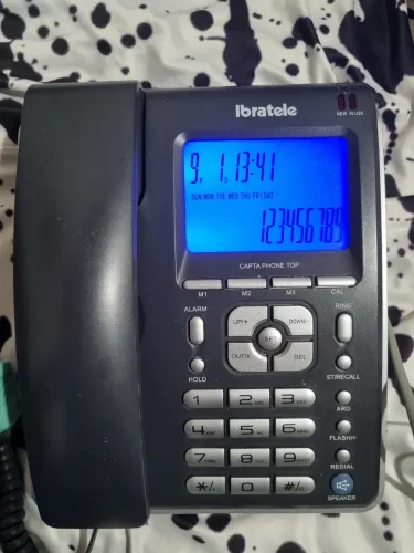 telefone fixo ibratele capta phone usado funcionando com calculadora