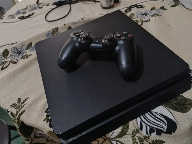 Vendo PS4 slim 1TB com caixa