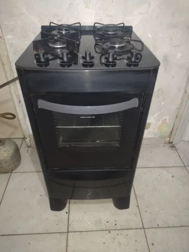 Fogão esmaltec 4 bocas todo de vidro praticamente novo pra hj temos entrega não eletrico