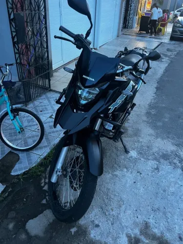 Vendo XRE 300 zap *62