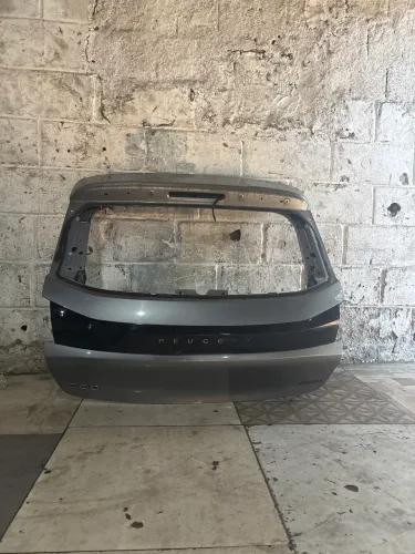 Tampa de mala Peugeot 208 22/24