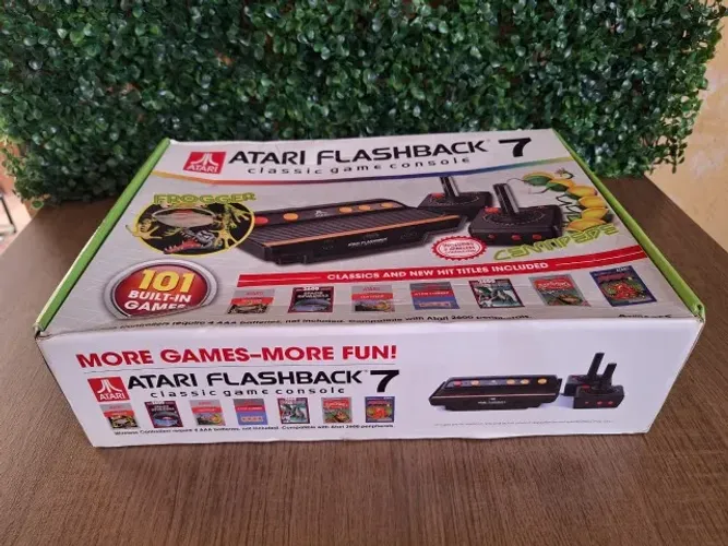 Atari flashback 7 completo na caixa funcionando mas leia