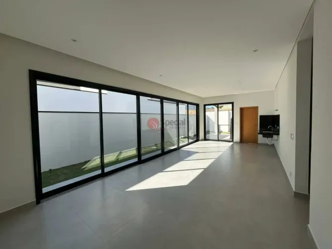 Casa em condomínio fechado em Taubaté, com 3 suítes e 4 vagas.