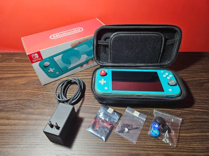 Nintendo Switch Lite + Acessórios