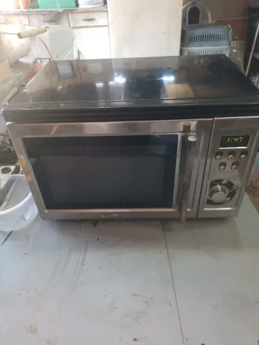 Micro ondas Sanyo perfeito gabinete inox com grill