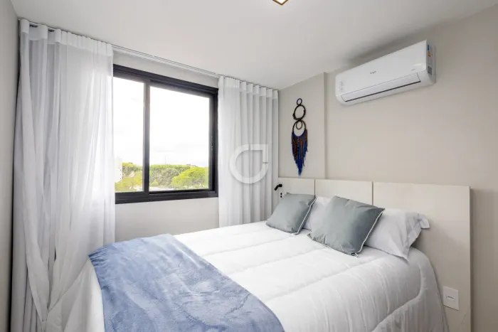 Apartamento compacto e funcional no Rebouças, ideal para estudantes próximos à PUC-PR