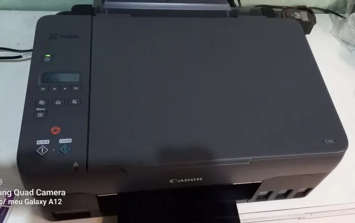 Impressora canon X pixma . Obs. Não está puxando folha, não nunca foi pra conserto